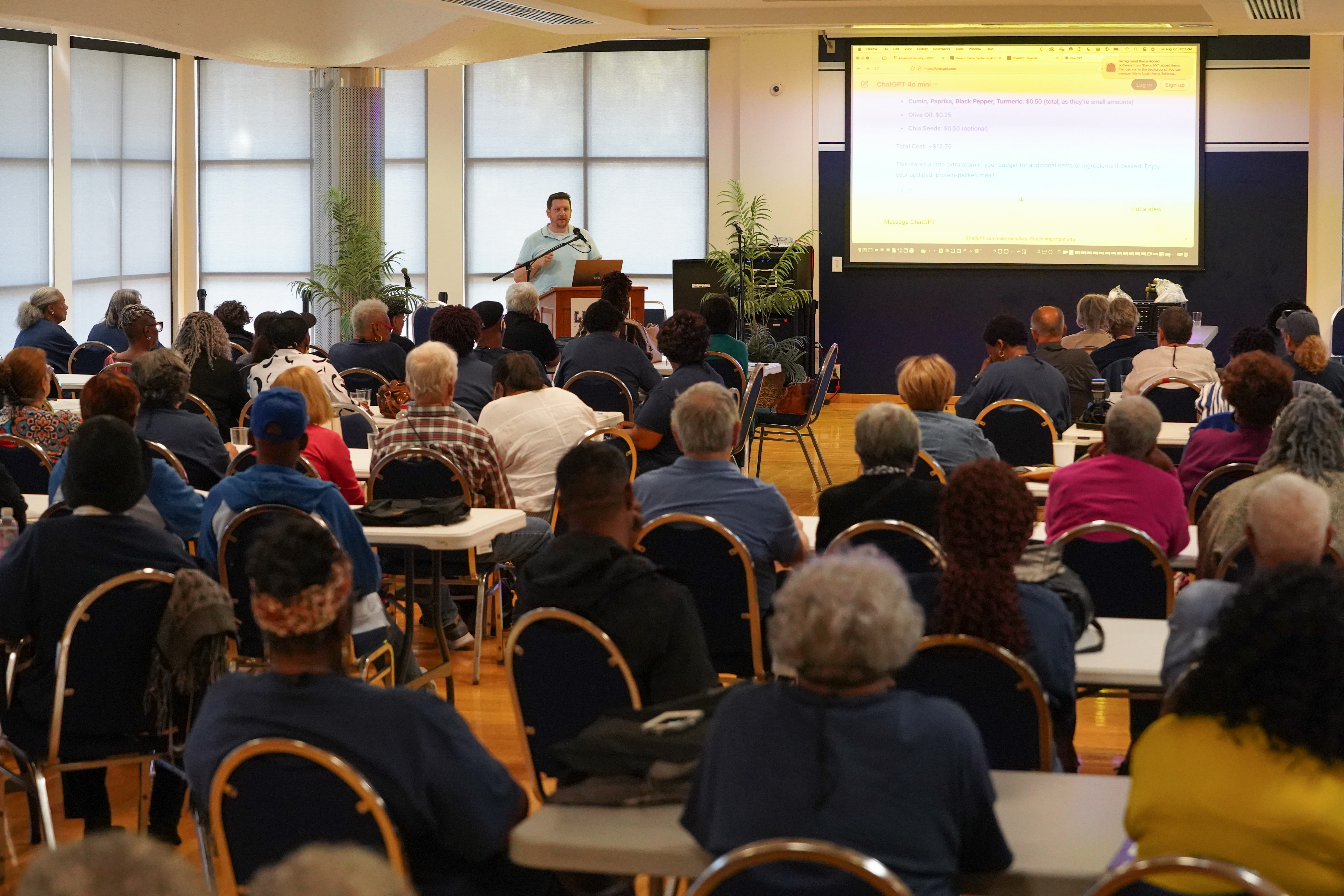 Joshua Dunne, LU’s commercial kitchen manager, demonstrating how to use ChatGPT to create nutritious, budget-friendly meals. 