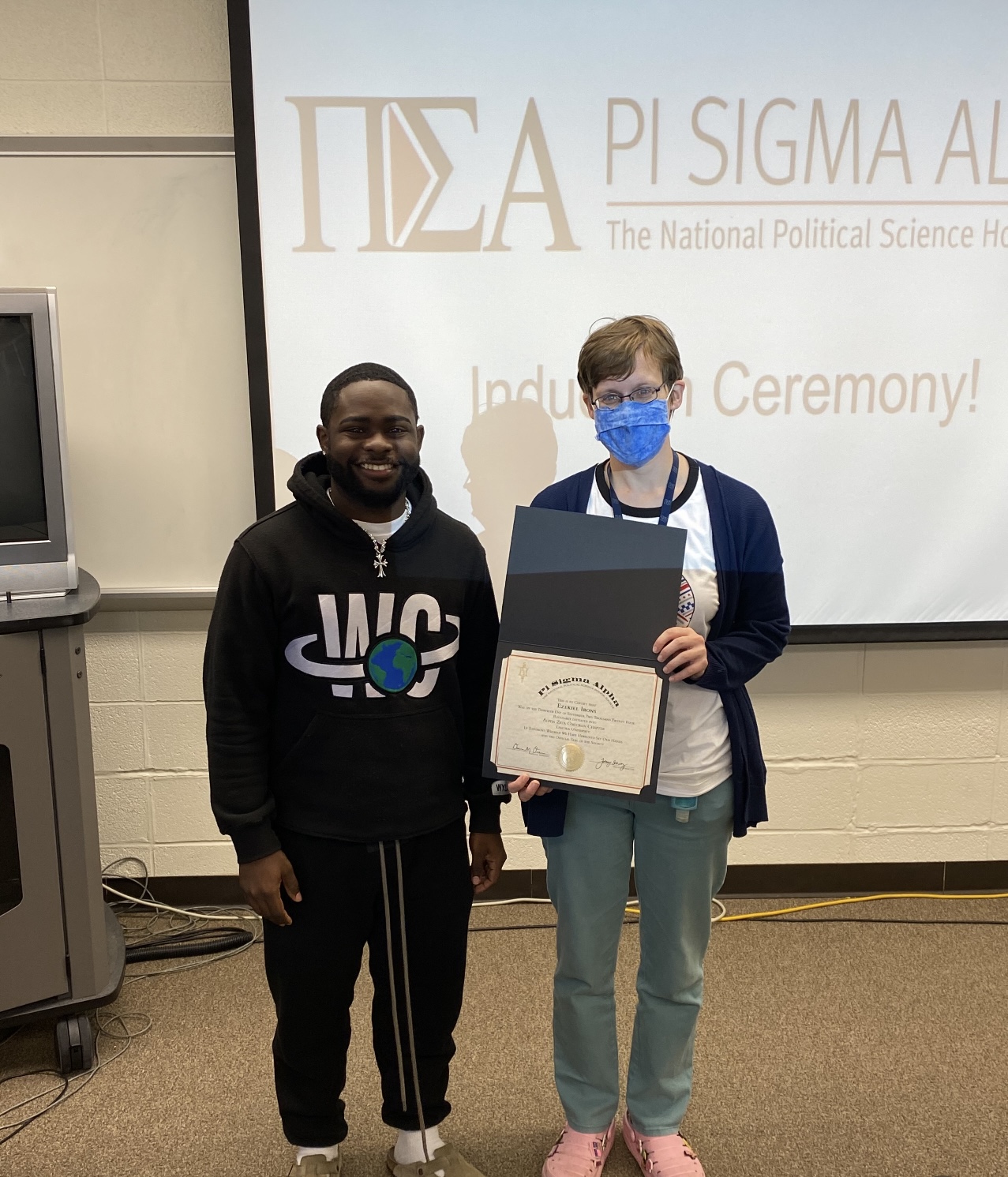 New Pi Sigma Alpha inductee, Ezekiel Irons, with chapter advisor, Dr. Elizabeth Dorssom.