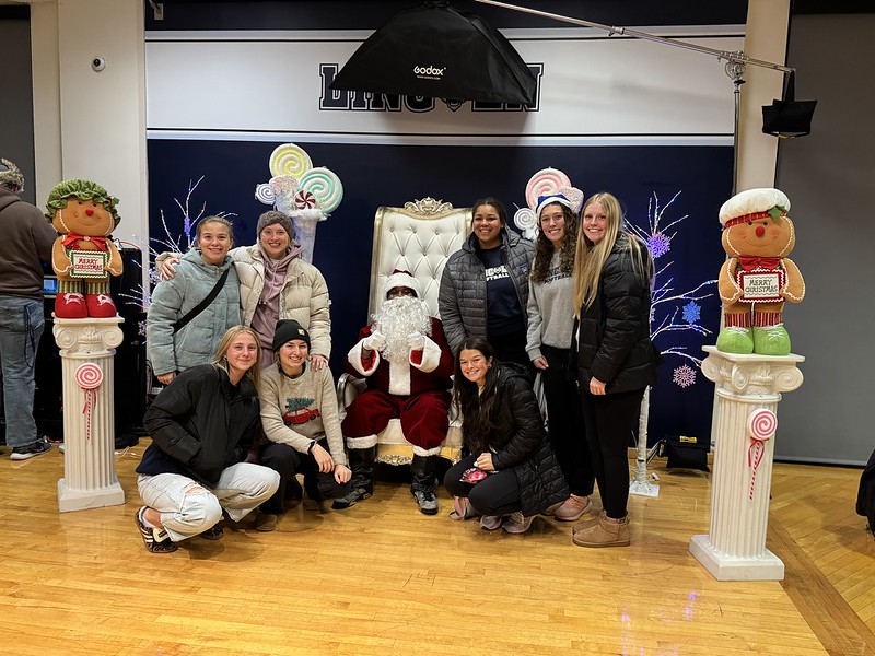 Participants visit with Santa at the 2024 LU Holiday Extravaganza.