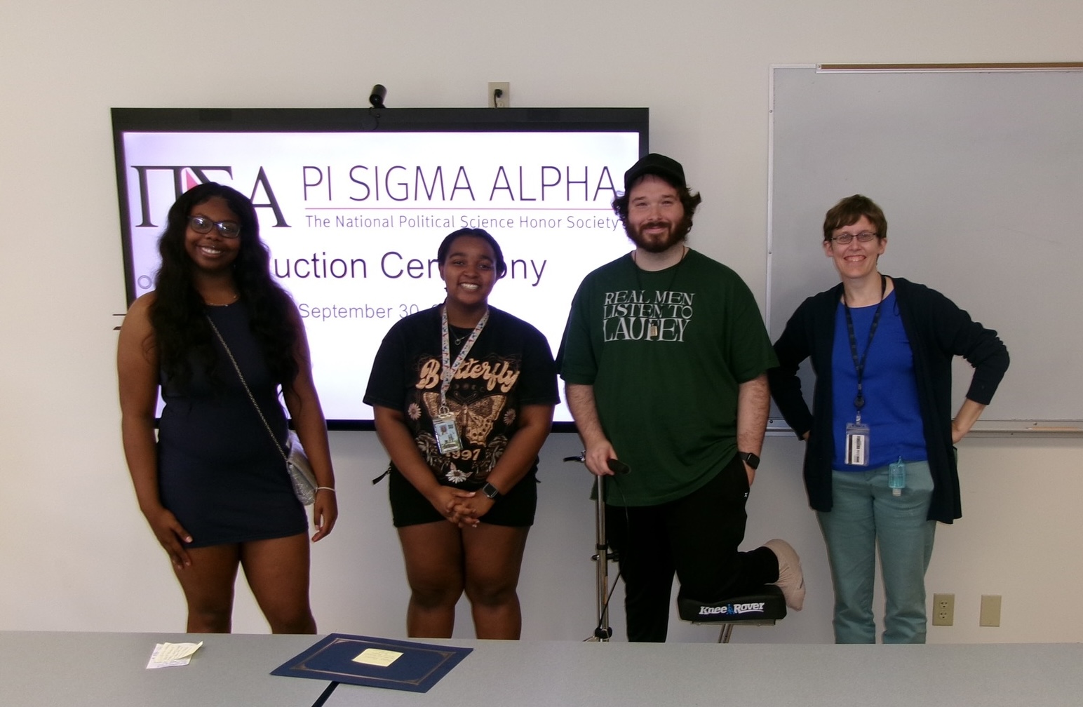 The Alpha Zeta Omicron chapter of Pi Sigma Alpha inducted Amari Fluelen and Ezekiel Irons on September 30. Pictured from left to right: Alannah Wade (vice president), Nia Walker (secretary), Max McCarthy (president) and Dr. Elizabeth Dorssom (chapter advisor).