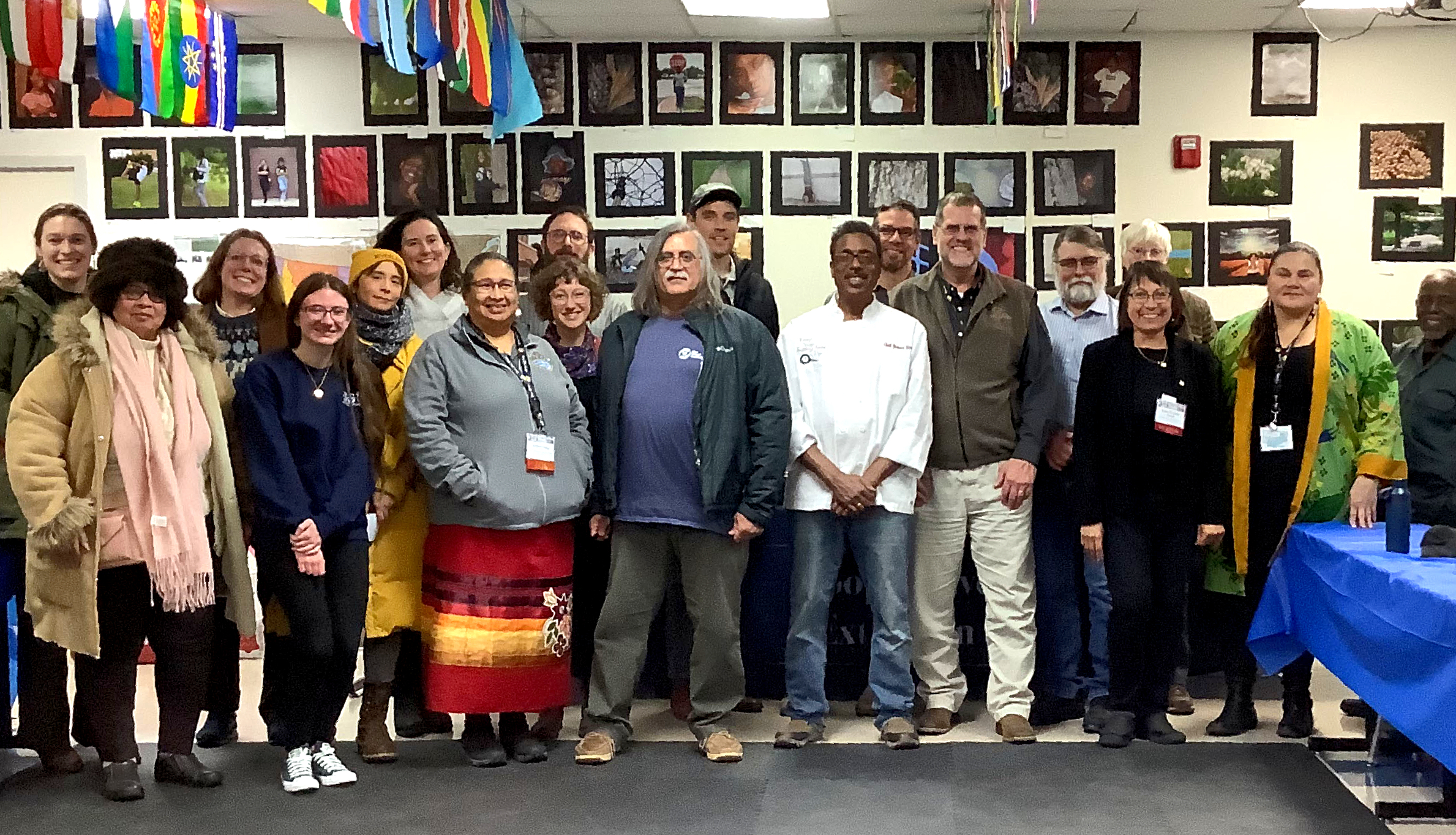 Group photo of diverse participants at LUCE St. Louis, smiling after a successful event.