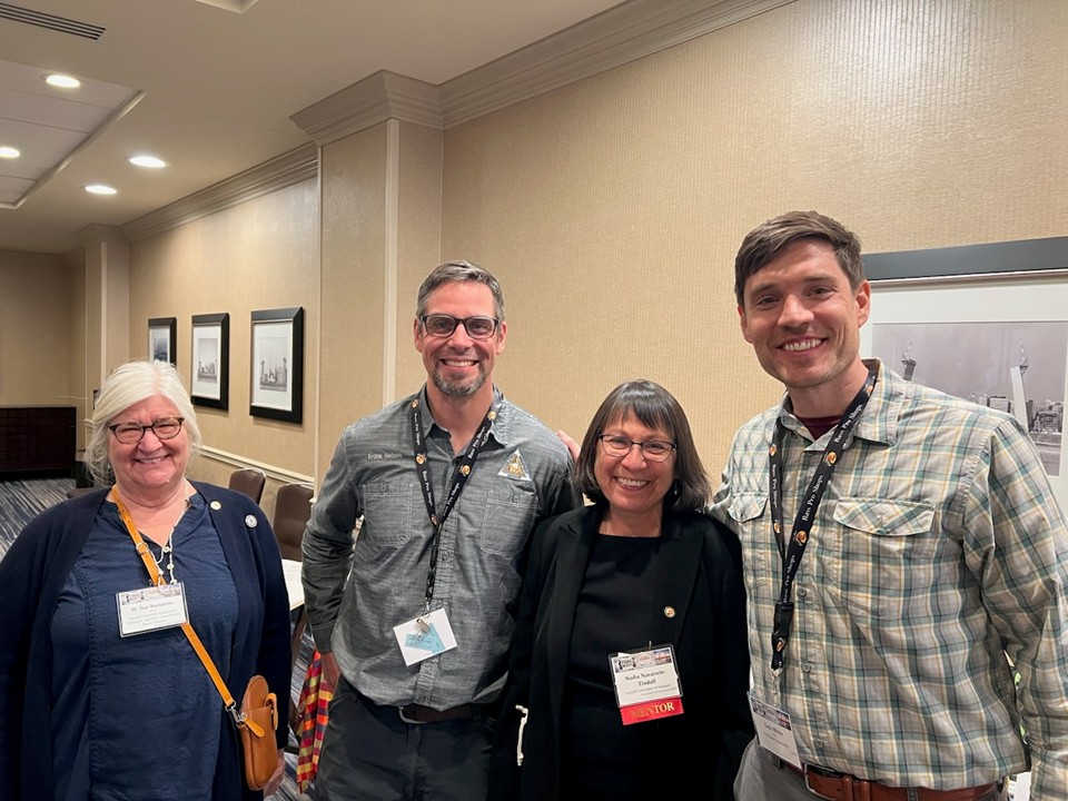 (Left to right) Frank Nelson, Nadia Navarrete-Tindall and Zack Miller take group photo at the 85th Midwest Fish and Wildlife Conference. 