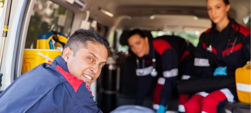 Two EMTs chat during a break