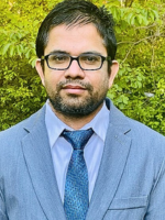 Dr. Mohan Acharya