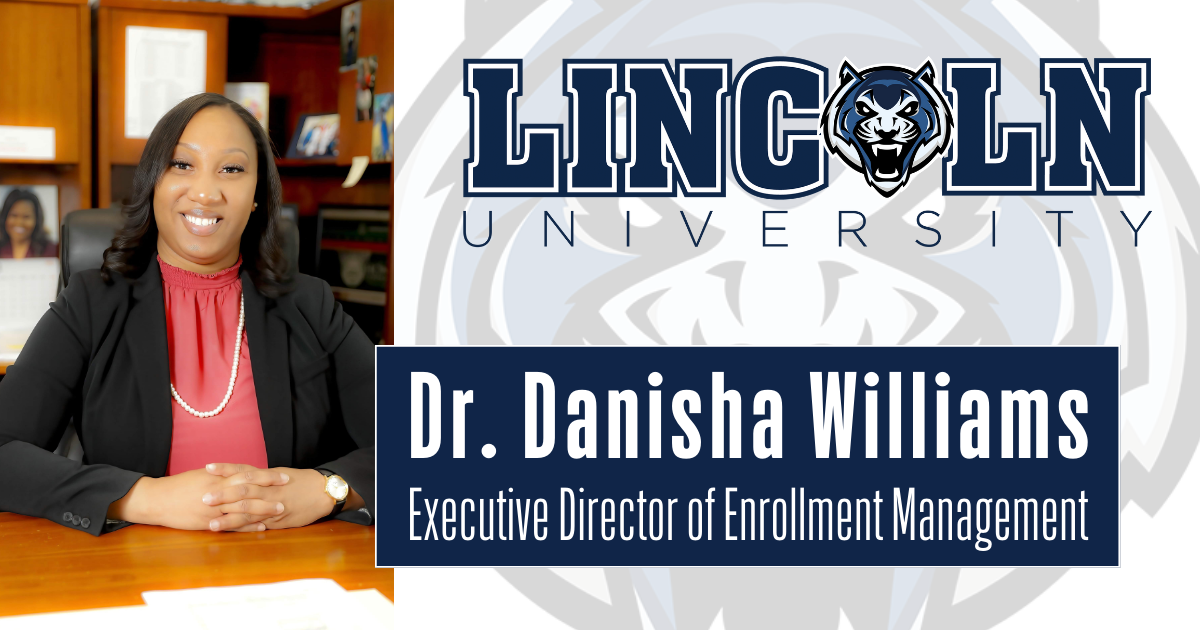 Dr. Danisha Williams, the Executive Director of Enrollment Management at Lincoln University, is pictured sitting at her desk, smiling confidently.