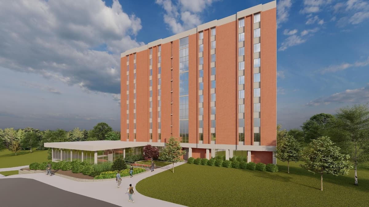 Architectural rendering of Dawson Hall at Lincoln University, showcasing a tall brick building with large windows, surrounded by landscaped greenery, trees, and a paved walkway with people walking nearby under a partly cloudy sky.