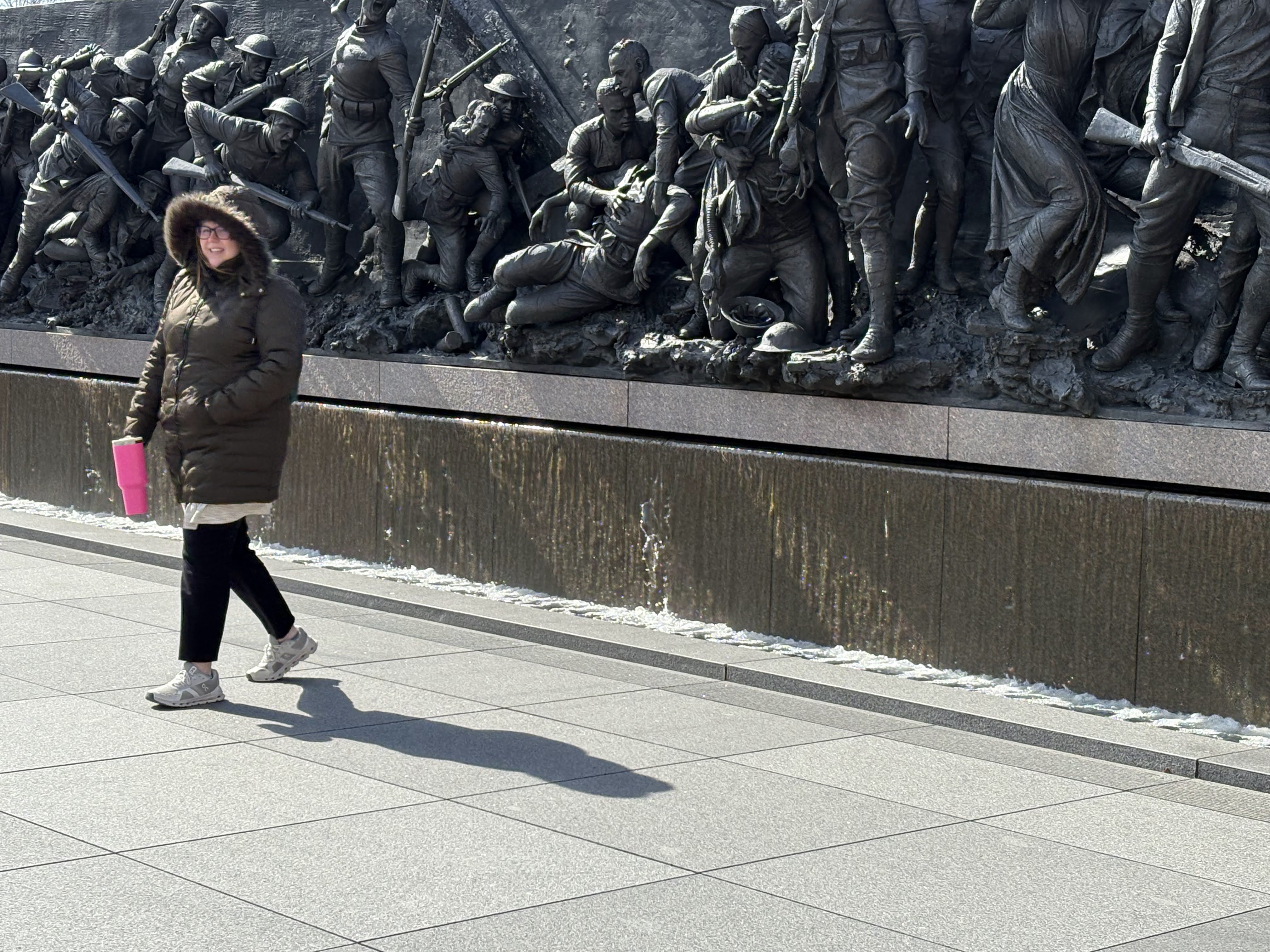 Maddie Twehus stands in front of the World War I Memorial.